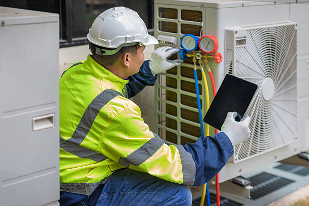 Professional Heat Pump Repair technician working in Westport, IN